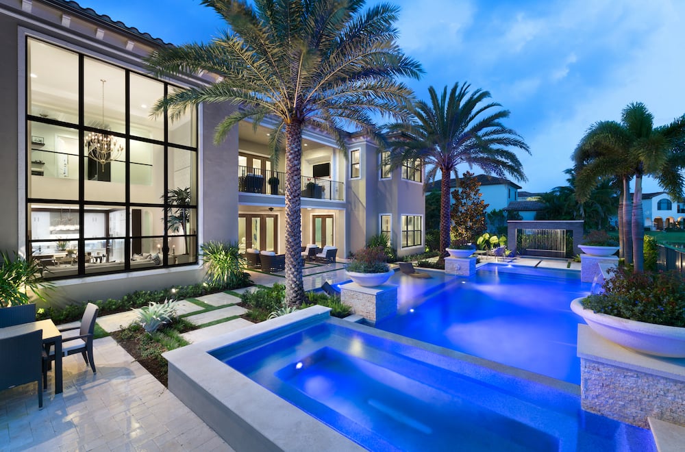 Award-winning pool at The Oaks, Boca Raton, lit at night