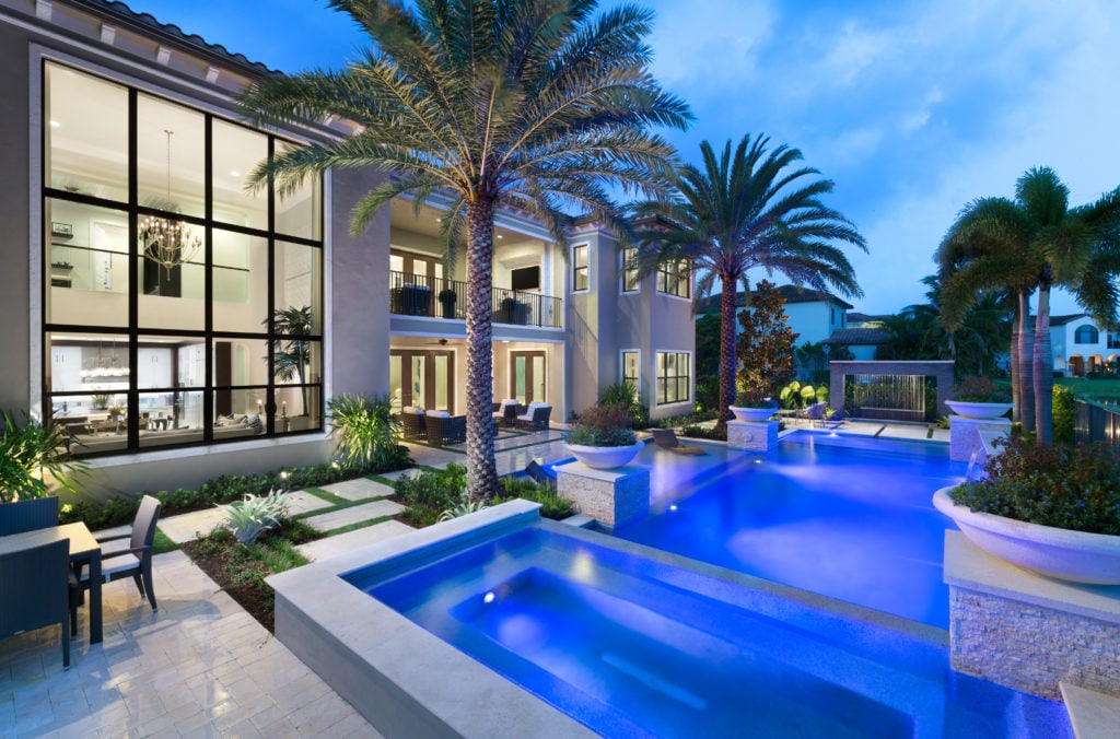 Fountain Blue Pools project at The Oaks at twilight